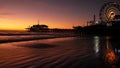 Twilight waves against classic illuminated ferris wheel, amusement park on pier in Santa Monica pacific ocean beach resort.