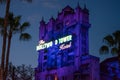 The Twilight zone Tower of Terror and palm trees on blue sky background in Hollywood Studios at Walt Disney World  7 Royalty Free Stock Photo