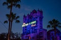 The Twilight zone Tower of Terror and palm trees on blue sky background in Hollywood Studios at Walt Disney World  3 Royalty Free Stock Photo