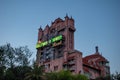 The Twilight zone Tower of Terror and palm trees on sunset background in Hollywood Studios at Walt Disney World  2 Royalty Free Stock Photo