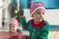 Twin babies elf helper of Santa Royalty Free Stock Photo