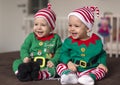 Twin babies elf helper of Santa Royalty Free Stock Photo