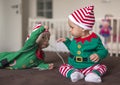 Twin babies elf helper of Santa Royalty Free Stock Photo