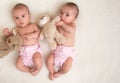 Twin babies girls with ecologic cloth diapers Royalty Free Stock Photo