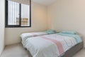 Twin Bedroom with Window Royalty Free Stock Photo