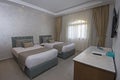 Twin beds in suite of a luxury hotel room Royalty Free Stock Photo