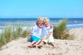 Twin brothers playing on the beach Royalty Free Stock Photo