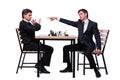 The twin brothers playing chess isolated on white Royalty Free Stock Photo