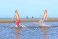 Twin brothers running on the beach Royalty Free Stock Photo