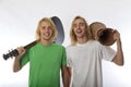 Twin brothers with their guitar and drum Royalty Free Stock Photo