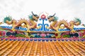 Twin dragon on chinese temple roof top Royalty Free Stock Photo