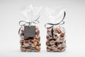 Twin elegant plastic bags of sweet chestnuts for gift Royalty Free Stock Photo