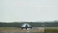 Twin engine commercial airplane landing in the airport with strong crosswind Royalty Free Stock Photo