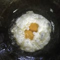Twin fried egg in metal pan