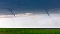 Twin funnel clouds from a pair of landspout tornadoes