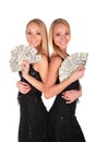 Twin girls with Dollars Royalty Free Stock Photo