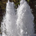 Twin jets of water surging upwards in a fountain Royalty Free Stock Photo