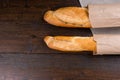 Twin loaves of french bread in bags Royalty Free Stock Photo