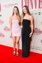 Twin Melody posing during the red carpet of the premiere, La reina del convento, Madrid Spain