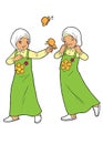 Twin muslim girls playing with butterflies