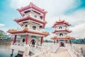 The Twin Pagodas on Jurong Lake, in the Chinese Garden with cloudy sky in Singapore Royalty Free Stock Photo