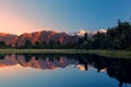 Twin Peaks reflect in the beautiful Lake Matheson at sunset, New Royalty Free Stock Photo