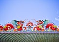 Twin red china dragon statue on the roof Royalty Free Stock Photo