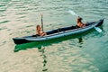 Twin sisters in a Canoe on the river in Ada Bojana, Montenegro Royalty Free Stock Photo