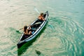 Twin sisters in a Canoe on the river in Ada Bojana, Montenegro Royalty Free Stock Photo