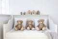 twin teddy bears in a childs room