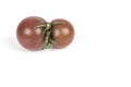 Twin tomatoes on white background