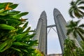 Twin tower with trees foreground in Kuala Lumpur, Malaysia.