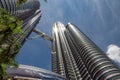 Twin towers Petronas and sky bridge at Mayl 18, 2013, Kuala Lumpur, Malaysia. Royalty Free Stock Photo