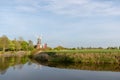 Twin windmills in Greetsiel in spring Royalty Free Stock Photo