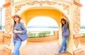 Twin Women Traveler with Golden Triangle Background