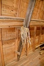Bundle of hanging twine on a barn rafter hayloft