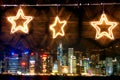 Twinkling star in the skyline of Victoria Harbor of Hong Kong in Christmas time