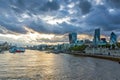 Twinlight cityscape of City of London and Thames River, England