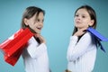 Twins arguing after shopping Royalty Free Stock Photo