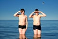 Twins brothers in a sea Royalty Free Stock Photo