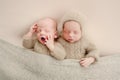 Twins newborn studio portrait