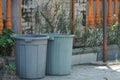 Twins of Plastic Grey Dustbin outside the gate_1 Royalty Free Stock Photo