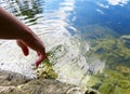 Twirling Finger in River