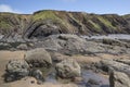 Twisted rock formations on the Cornish cliffs Royalty Free Stock Photo