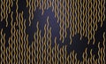 Twisted gold metallic threads on a dark background
