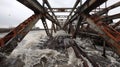The twisted metal beams of a collapsed bridge resemble a tangled web a striking image of the destruction caused by the
