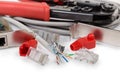 Twisted pair cable and connectors against network components, crimping tool Royalty Free Stock Photo