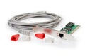 Twisted pair connectors and protective caps, cable and network card Royalty Free Stock Photo