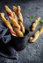Twisted puff pastry sticks with bacon Royalty Free Stock Photo