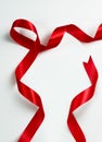 Twisted Red ribbon frame on white Royalty Free Stock Photo
